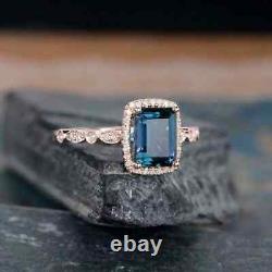 2Ct Emerald Cut Lab Created London Blue Topaz Women's Ring 14K Rose Gold Plated