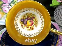 Aynsley tea cup and saucer painted orchard D. Jones band of gold teacup athens