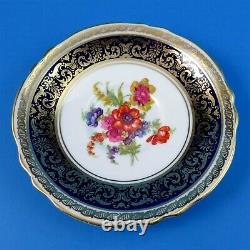 Cobalt Blue and Gold Border with Bright Floral Center Paragon Tea Cup and Saucer
