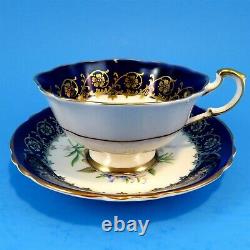 Lovely Cobalt Blue with Gold and Rose Floral Center Paragon Tea Cup and Saucer
