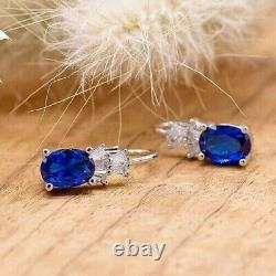 Oval Cut Simulated Blue Sapphire Pretty Drop Earrings In 14k White Gold Plated