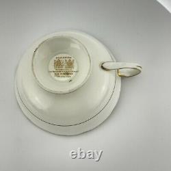 Paragon tea cup saucer set by appointment gold floral cobalt blue porcelain