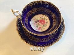 Signed paragon tea cup saucer cobalt blue pink flower gold gilt paint