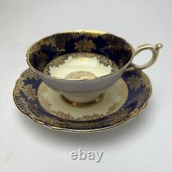 Vintage Paragon Cobalt Blue and Gold Ornate Lace Detail Teacup and Saucer Ivory