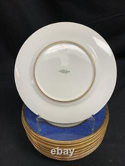 Assiettes de souper en porcelaine de Chine Cauldon Angleterre Est 1774, avec bande bleu cobalt et bordure dorée, 9 assiettes, 12 pièces.