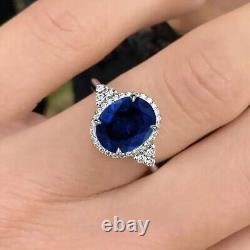 Bague de fiançailles ovale en saphir bleu simulé Halo 2.50 Ct plaqué or blanc 14 carats