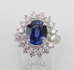 Bague de mariage en halo avec saphir bleu simulé de coupe ovale de 2,40 carats plaqué or blanc 14 carats