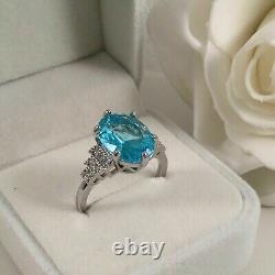 Bague de mariage pour femme en argent plaqué or blanc 14 carats avec topaze bleue simulée ovale de 2 carats