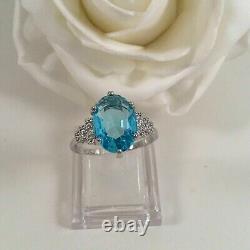 Bague de mariage pour femme en argent plaqué or blanc 14 carats avec topaze bleue simulée ovale de 2 carats