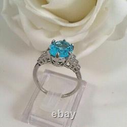 Bague de mariage pour femme en argent plaqué or blanc 14 carats avec topaze bleue simulée ovale de 2 carats