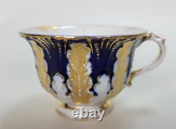 Ensemble tasse et soucoupe en porcelaine de Meissen bleu cobalt et feuille d'or antique