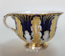 Ensemble tasse et soucoupe en porcelaine de Meissen bleu cobalt et feuille d'or antique