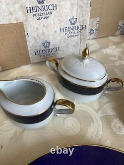 Service de dîner en porcelaine Heinrich 44 pièces en bleu cobalt et or pour 8 personnes. Neuf dans sa boîte.