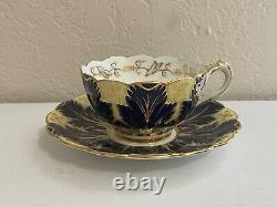 Tasse à thé et soucoupe en porcelaine Cauldon antique, décorées de cobalt et de feuilles d'or
