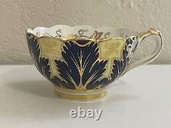 Tasse à thé et soucoupe en porcelaine Cauldon antique, décorées de cobalt et de feuilles d'or