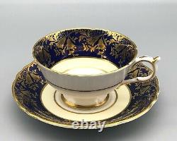 Tasse et soucoupe en porcelaine fine Paragon VTG à motifs de roses American Beauty bleu cobalt, or et rouge.